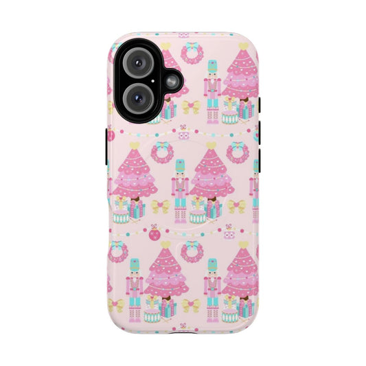 A pink phone case with a Christmas tree, wreath, and bow design