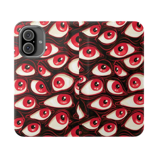 Closeup of a flip phone case featuring a pattern of bright, colorful eyeballs against a pastel background.