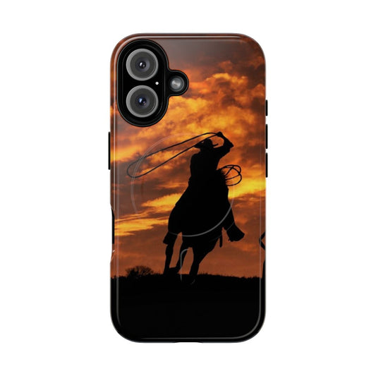 Silhouette of cowboys on horses against a fiery sunset sky on a tough magnetic phone case