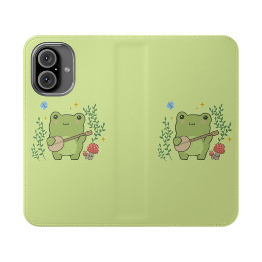 Whimsical cottagecore-style phone case featuring a frog playing a banjo, surrounded by mushrooms and blue butterflies.