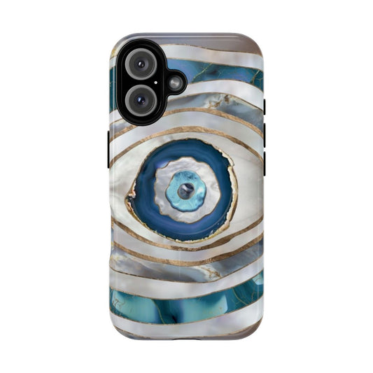 Stylish phone case featuring intricate evil eye, Greek amulet, and nazar motifs with gold accents against a mineral texture background.