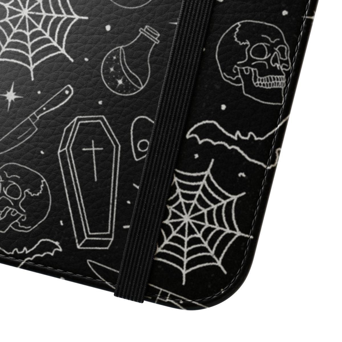 A spooky flip phone case featuring skulls, bats, and other Halloween-inspired designs. - Close Up