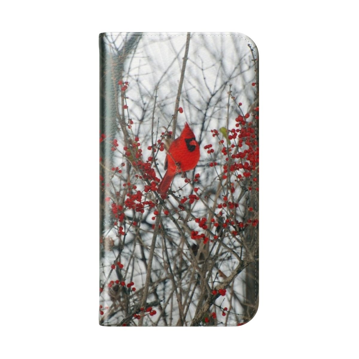 A vibrant red cardinal bird perched on a tree branch, featured on a durable phone case cover. - Folded Back