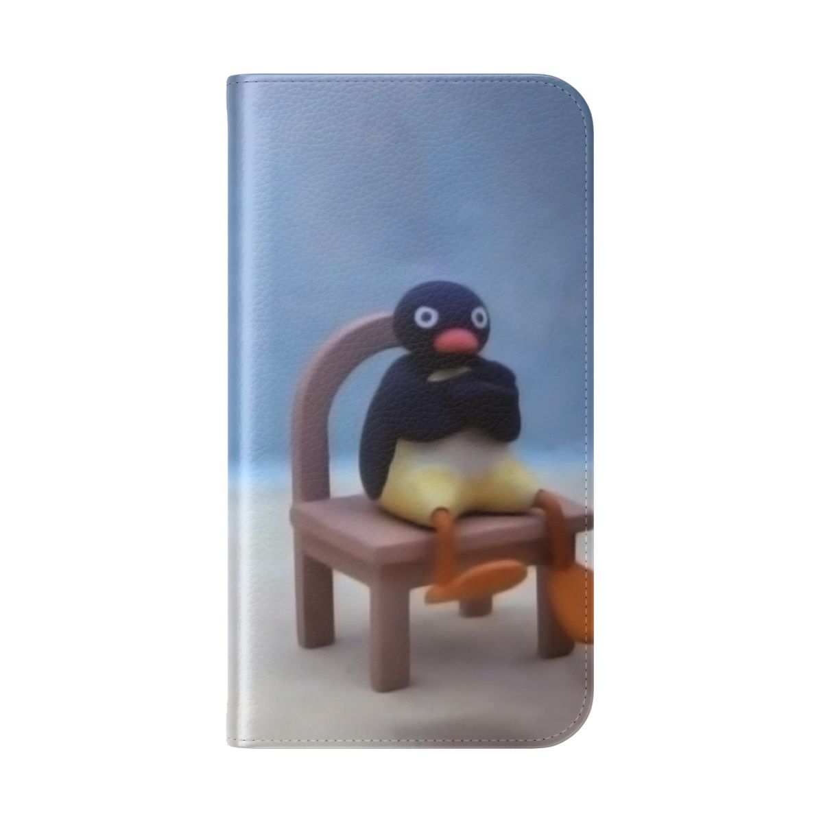 A colorful flip cover phone case featuring the beloved Pingu cartoon character. - Folded Back