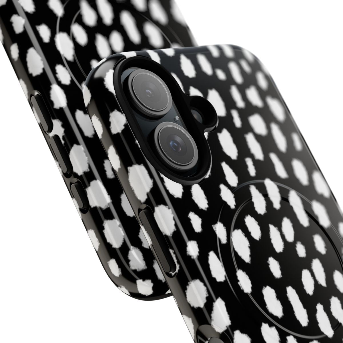 Handmade polka dot phone case with black and white brush stroke pattern, resembling a reverse dalmatian design. - Detail