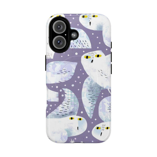 Snowy owl perched on a branch in a snowy winter landscape, featured on a stylish and protective magnetic phone case.