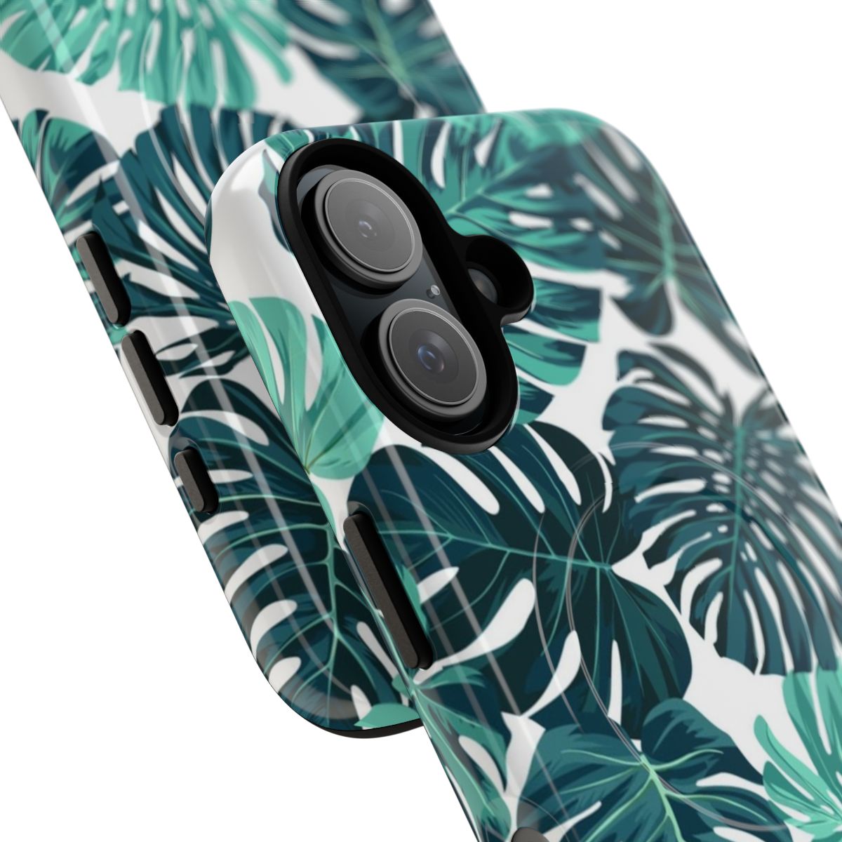 A green and blue monstera leaf pattern phone case with a magnetic closure. - Detail