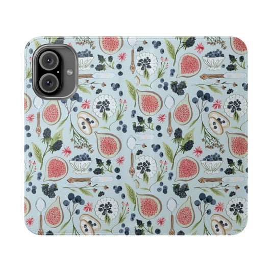 Vibrant watercolor illustration of blueberries, figs, and other breakfast ingredients on a blue and pink floral phone case cover.