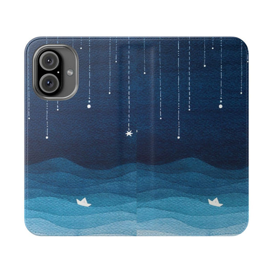 Blue flip phone case with a watercolor design featuring falling stars, sailboats, and a night sky