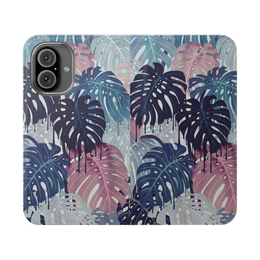 A flip cover phone case featuring a surreal, melted design of tropical monstera leaves in blue and pink.