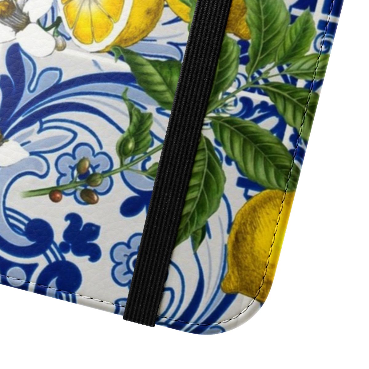 Mediterranean-inspired lemon and blue ceramic tile pattern on a flip phone case - Close Up