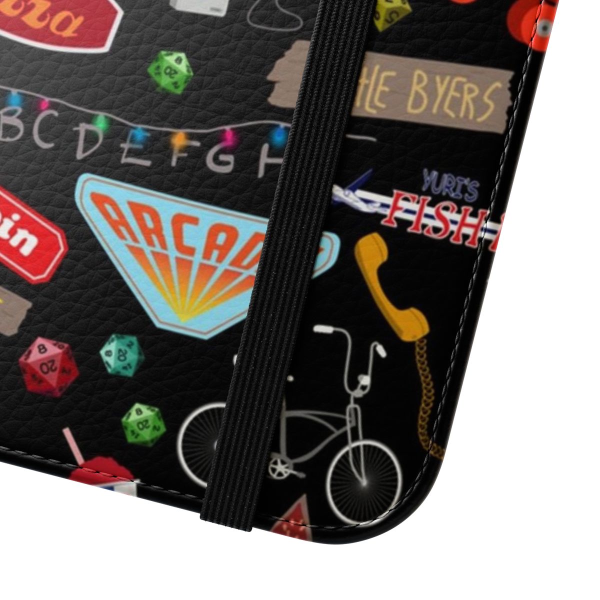 A Stranger Things themed flip cover phone case with an assortment of patterns and designs from the popular Netflix series. - Close Up