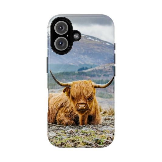 Magnetic tough phone case with a portrait of a fluffy, black and white highland cow in a natural, farm setting.