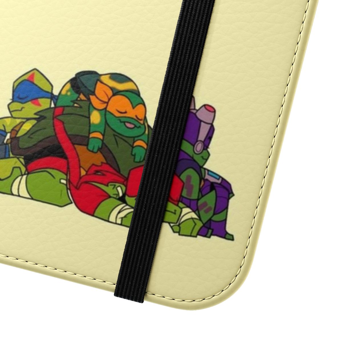 A flip cover phone case featuring the Teenage Mutant Ninja Turtles characters in a napping pose. - Close Up