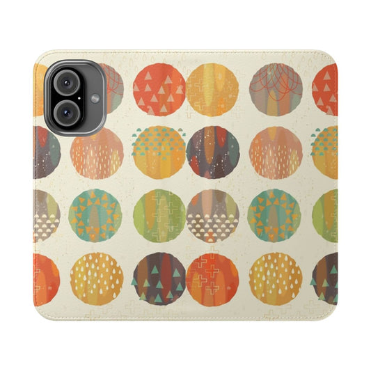 Vibrant and abstract phone case featuring a geometric pattern of celestial bodies and planets.