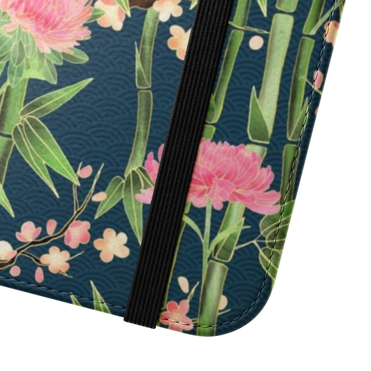 A dark teal flip phone case featuring a beautiful pattern of bamboo, birds, and blossoms. - Close Up