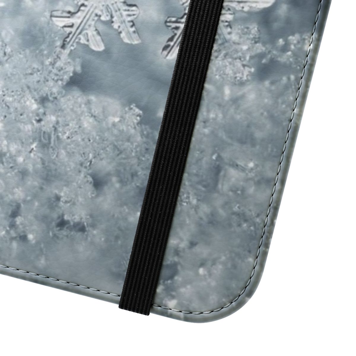 Snowflake-patterned flip cover phone case in white and blue tones. - Close Up