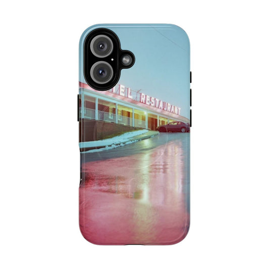 Artistic photography of rainy motel lights and reflections on a magnetic phone case.