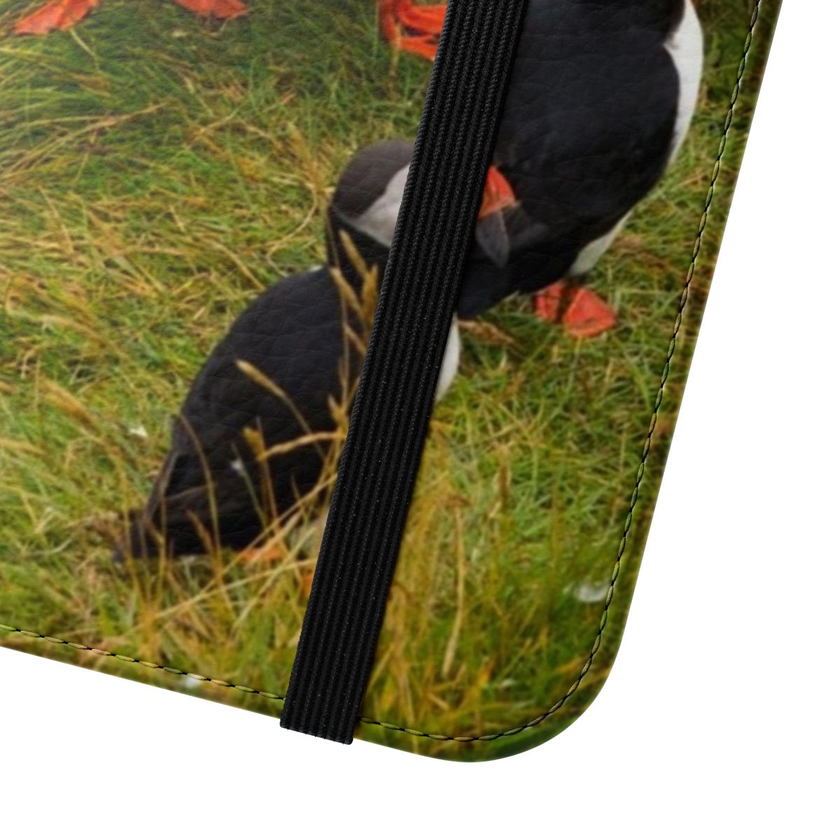 A high-quality flip cover phone case featuring an illustration of a puffin, the iconic bird of Iceland. - Close Up