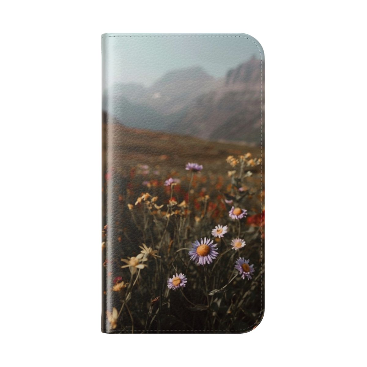 A phone case featuring a scenic landscape with mountains, wildflowers, and a golden hour sky. - Folded Back