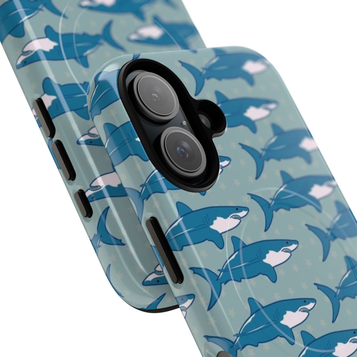 A phone case with a vibrant shark pattern design, featuring blue sharks and polka dots on a magnetic, tough case. - Detail