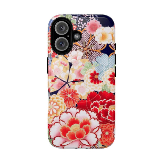 Antique-inspired phone case featuring a vibrant floral pattern with pink, white, and blue hues in a kimono-style design.