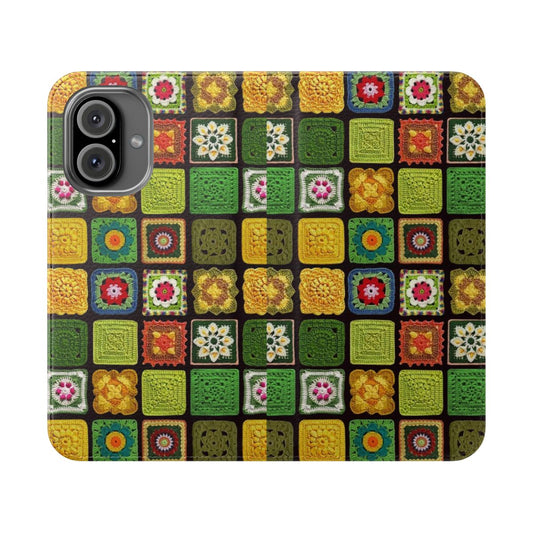 Handmade crochet phone case in black with bright, colorful granny squares