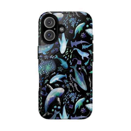 Glowing phone case design featuring whales, sharks, and other ocean life in a night dive scene.