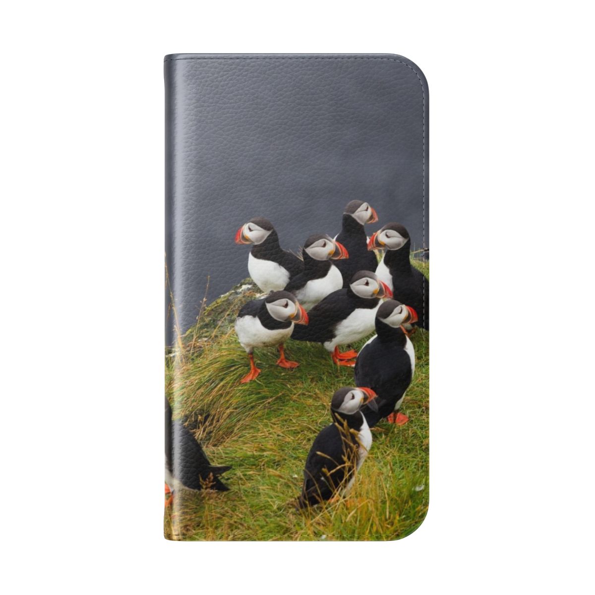 A high-quality flip cover phone case featuring an illustration of a puffin, the iconic bird of Iceland. - Folded Back