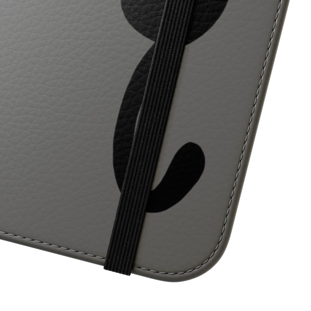 A playful tuxedo cat clinging to the edge of a phone case with a black and white design. - Close Up