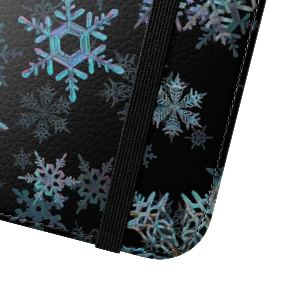 Embroidered snowflake design on a dark phone case for the winter and holiday season. - Close Up