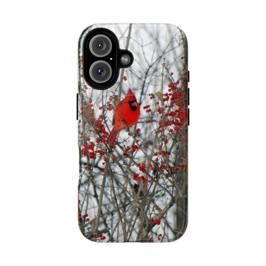 Closeup photo of a vibrant red cardinal bird perched on a winter branch, featured on a stylish phone case